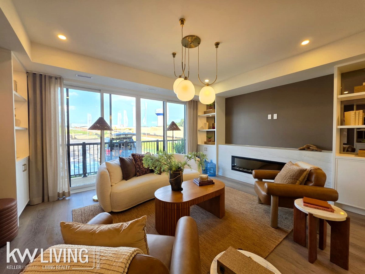 AVELLA model suite living room with balcony doors